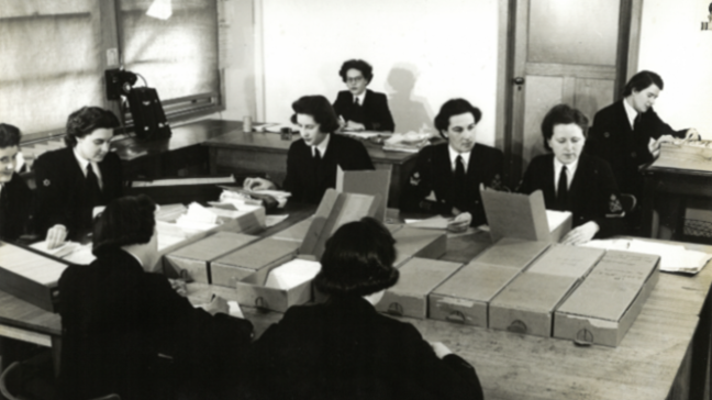 WRANS in the fileroom at FRUMEL. Image from National Archives of Australia (NAA 7648060)