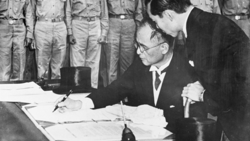 AWM 040962. 2 September 1945. The Foreign Minister of Japan, Mamoru Shigemitsu signs the Japanese Instrument of Surrender aboard USS Missouri in Tokyo Bay, Japan. https://www.awm.gov.au/collection/C13713 