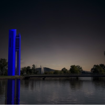 The National Carillion lit up blue, located on Aspen Island, Lake Burley Griffin (National Capital Authority)